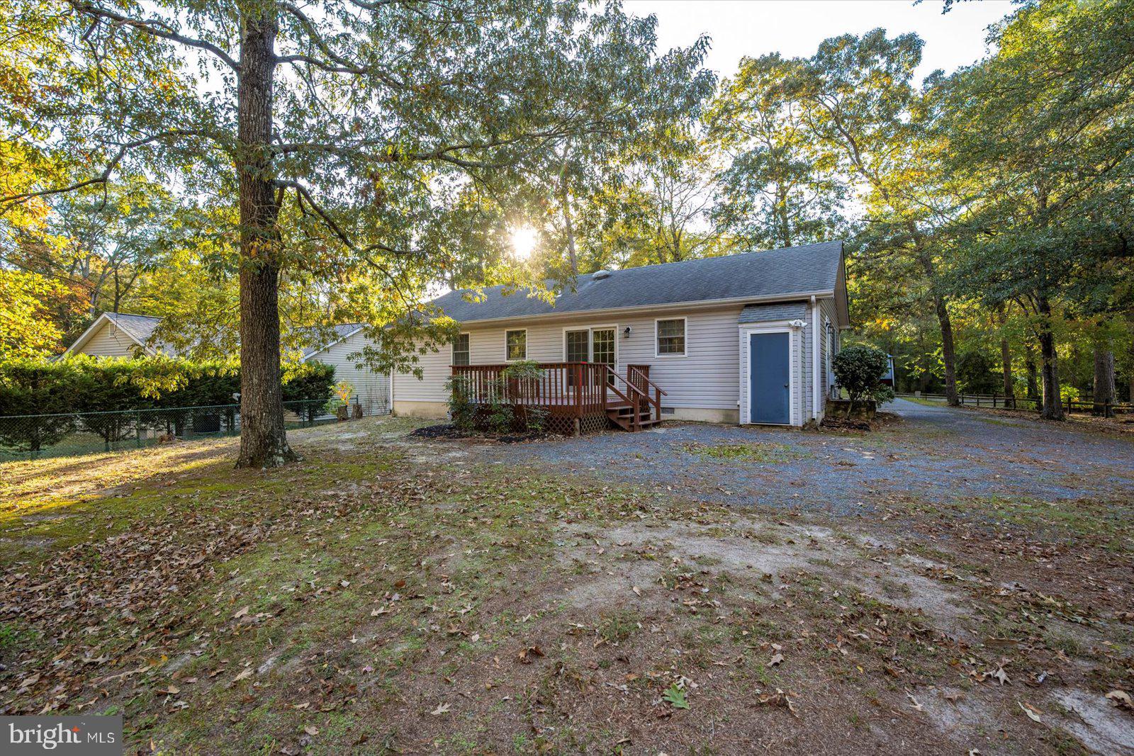 5079 Old Mill Branch Road Salisbury, MD 21801 - Photo 38 of 47 a view of a house with a yard
