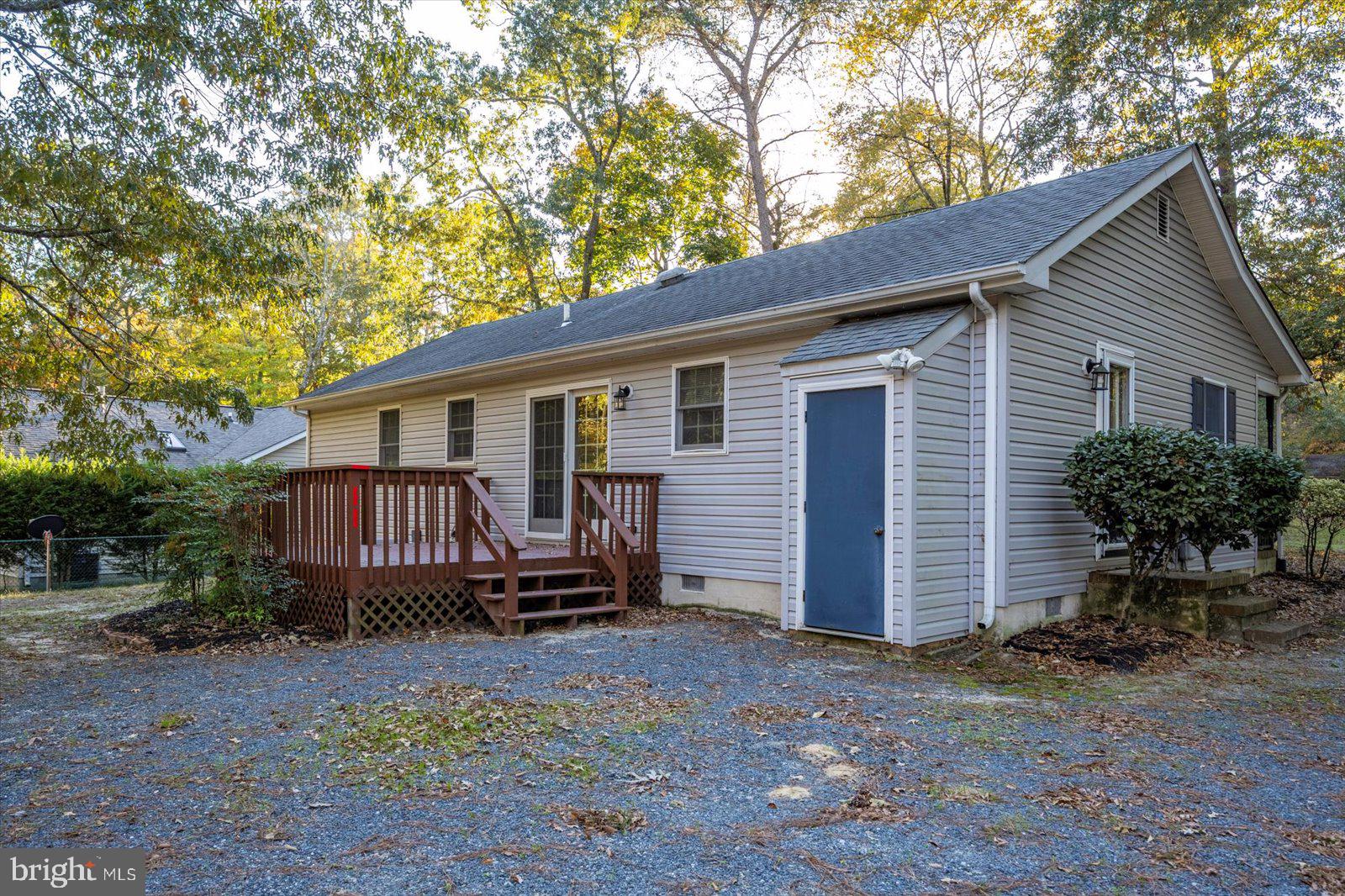 5079 Old Mill Branch Road Salisbury, MD 21801 - Photo 39 of 47 a view of a house with a yard and large tree