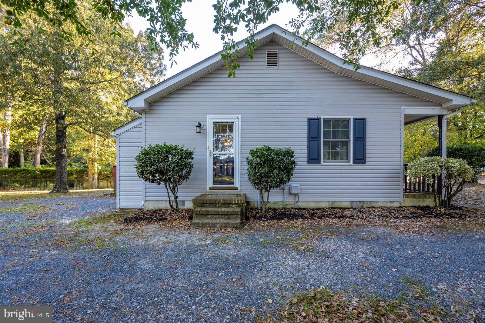 5079 Old Mill Branch Road Salisbury, MD 21801 - Photo 41 of 47 a view of a house with backyard and garden