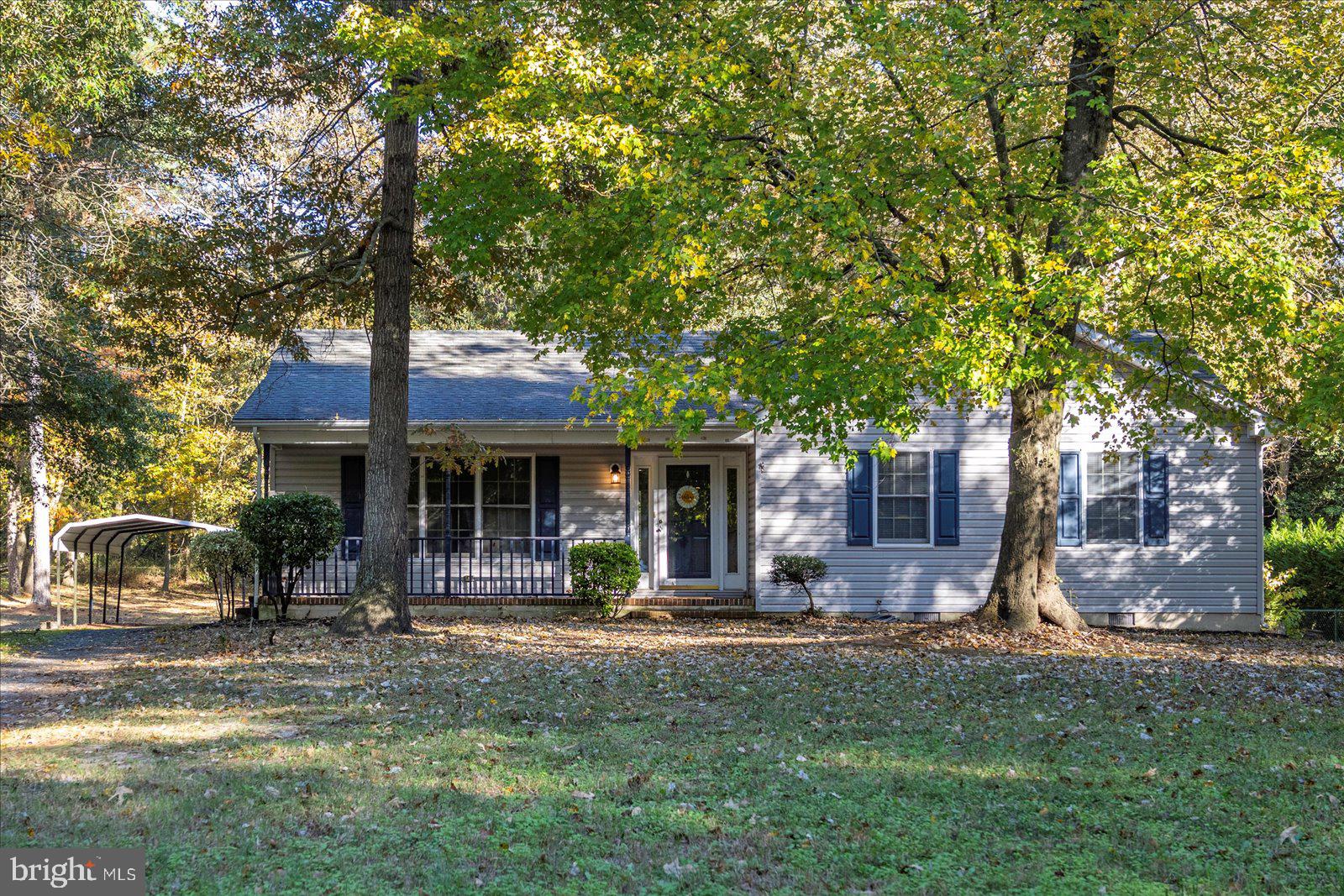 5079 Old Mill Branch Road Salisbury, MD 21801 - Photo 44 of 47 a front view of a house with garden