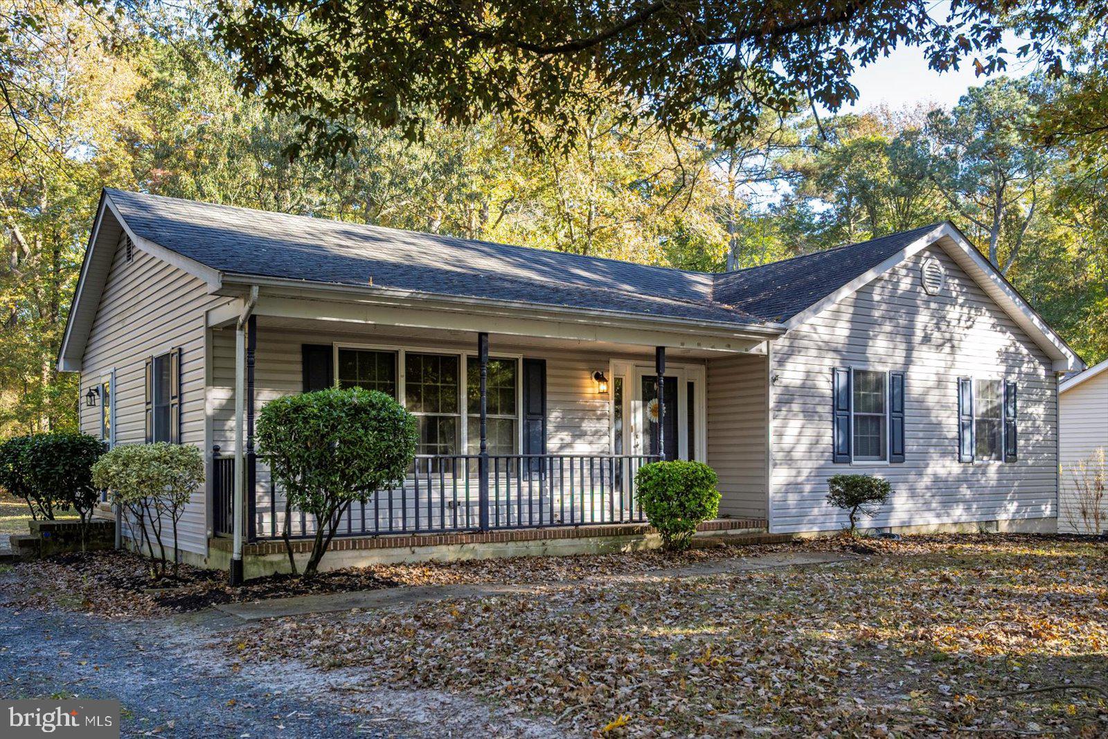 5079 Old Mill Branch Road Salisbury, MD 21801 - Photo 47 of 47 a front view of a house with garden