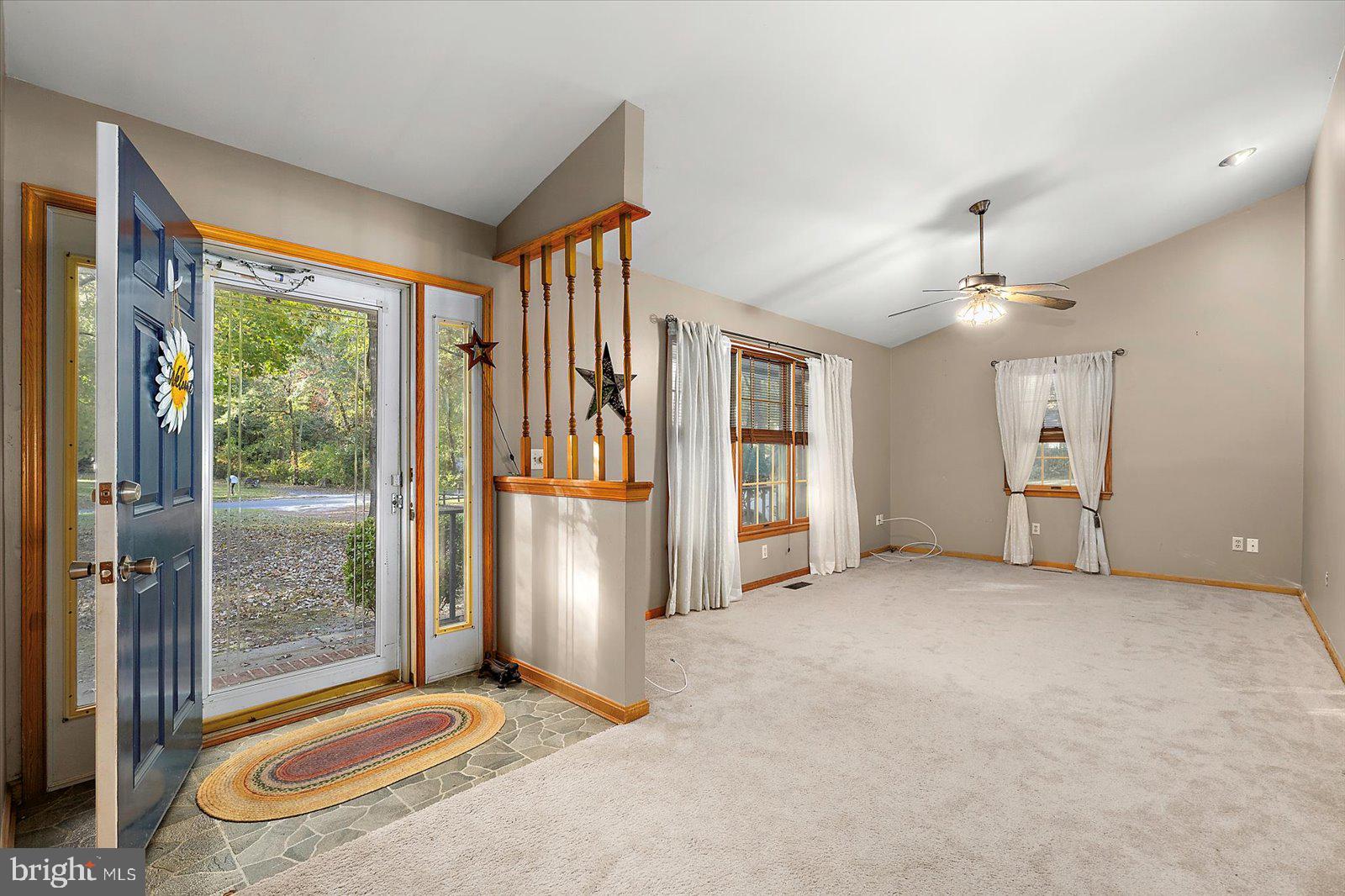 5079 Old Mill Branch Road Salisbury, MD 21801 - Photo 6 of 47 a view of a room with windows and entryway