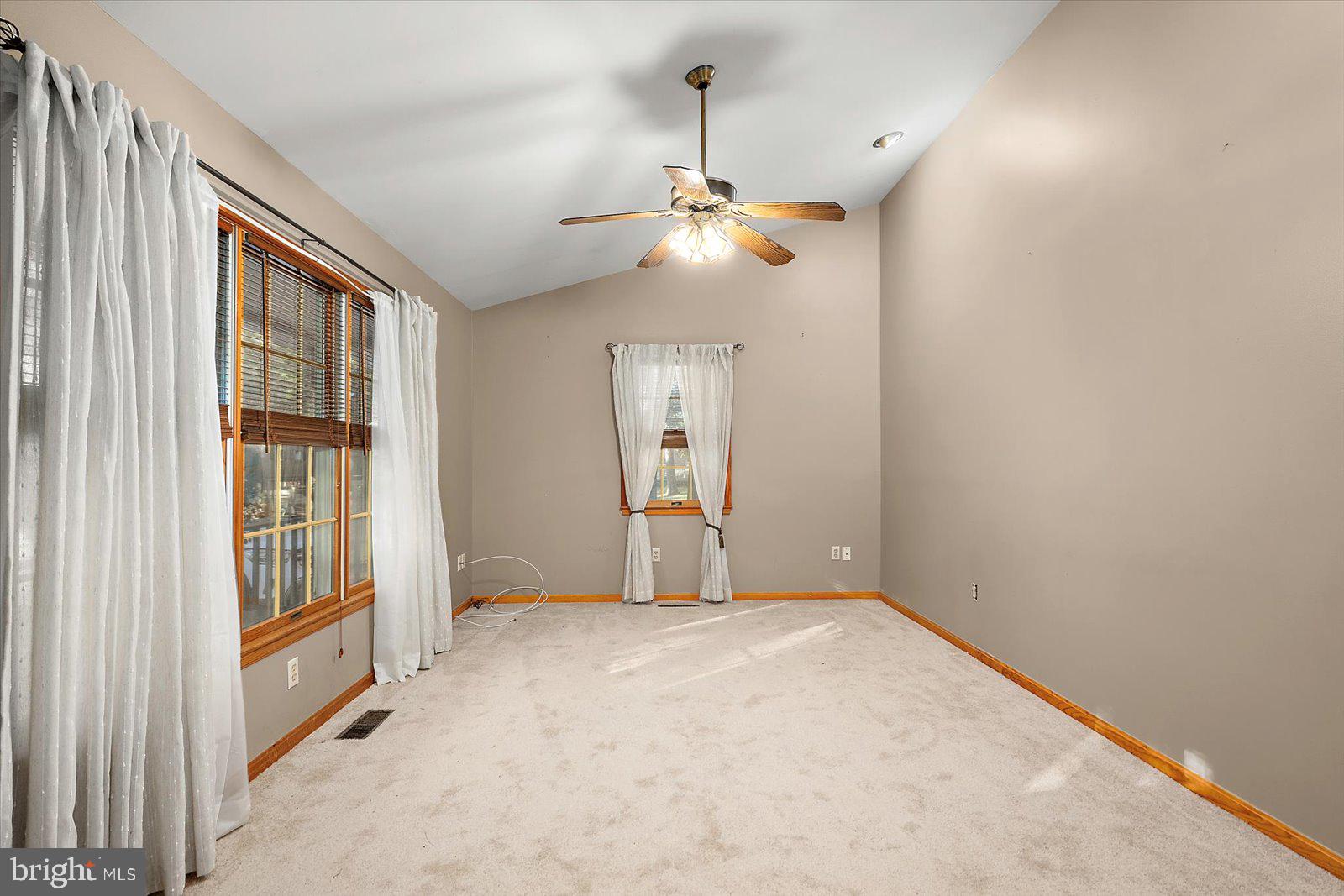 5079 Old Mill Branch Road Salisbury, MD 21801 - Photo 7 of 47 a view of an empty room with a window