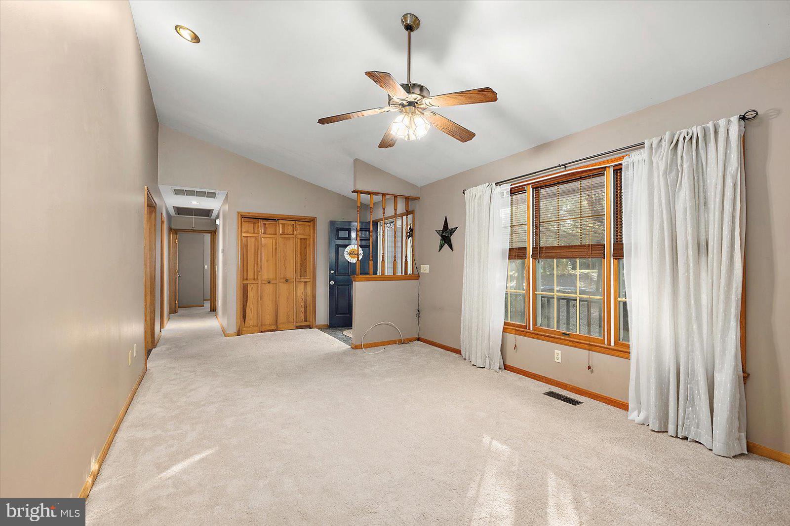 5079 Old Mill Branch Road Salisbury, MD 21801 - Photo 8 of 47 a view of an empty room with a window