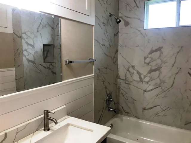 a view of a park with swings and slides