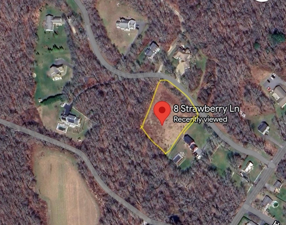 8 Strawberry Lane Westport, MA 02790 - Photo 10 of 12 a sign on the side of the road