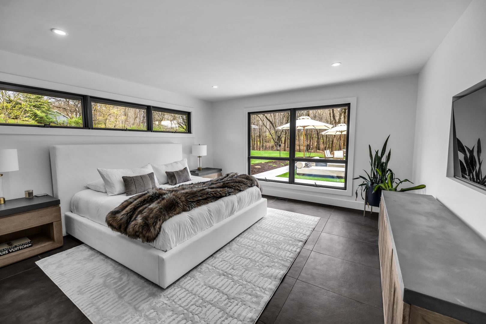 65 South Shores Drive Decatur, IL 62521 - Photo 11 of 25 a spacious bedroom with a bed and a large window