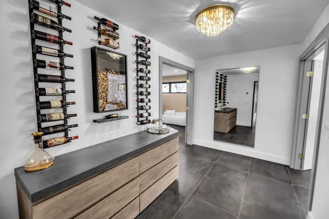 a view of kitchen with sink and window