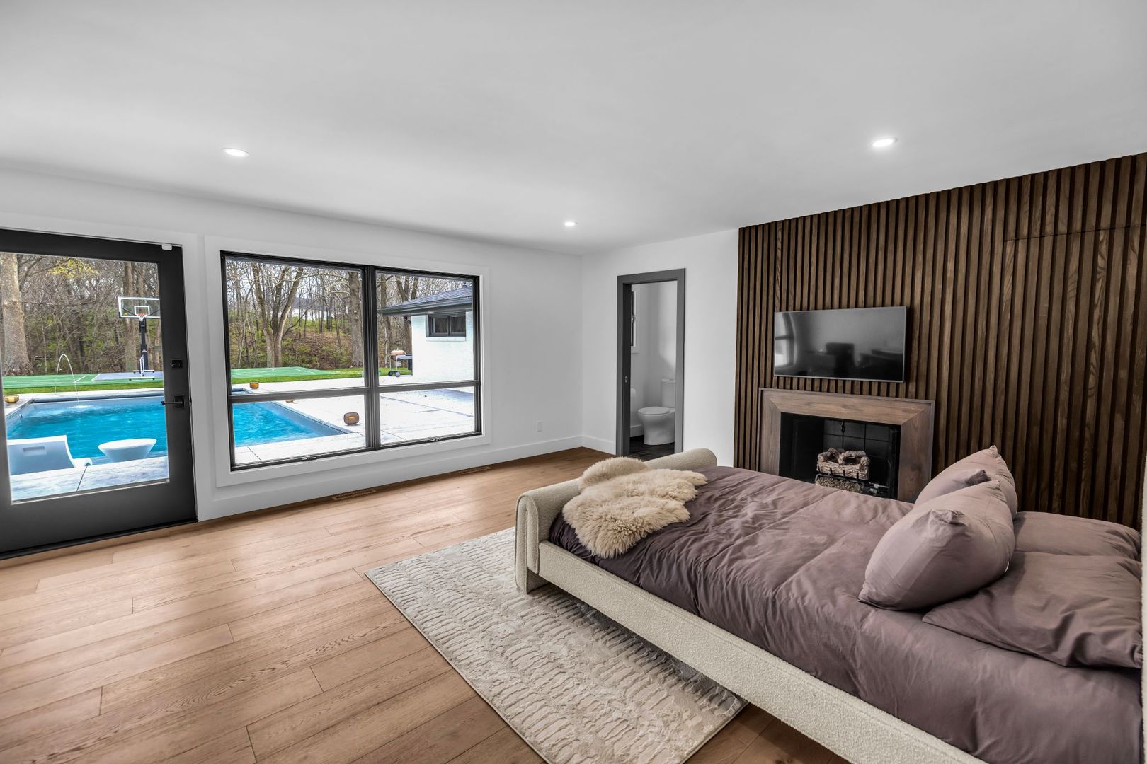 65 South Shores Drive Decatur, IL 62521 - Photo 20 of 25 a bedroom with a large bed and a large window