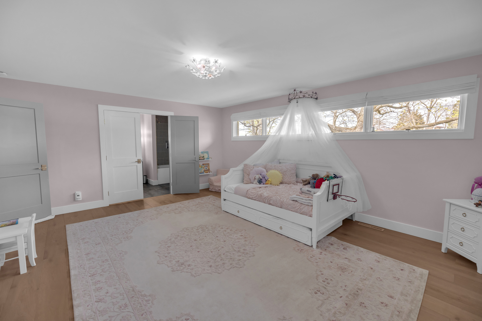 65 South Shores Drive Decatur, IL 62521 - Photo 9 of 25 a living room with furniture and a chandelier