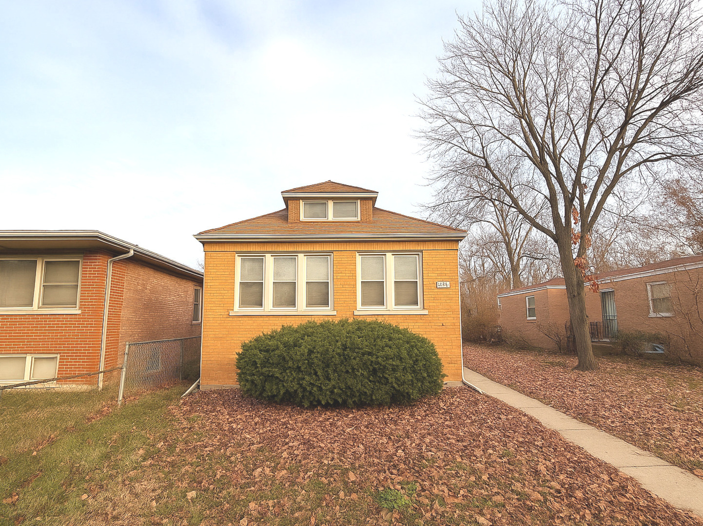 1406 West 109th Place Chicago, IL 60643 - Photo 1 of 23 a front view of a house with a yard