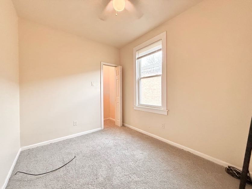 1406 West 109th Place Chicago, IL 60643 - Photo 11 of 23 an empty room with windows