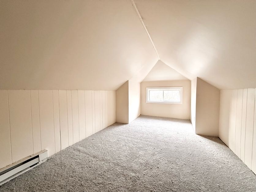 1406 West 109th Place Chicago, IL 60643 - Photo 16 of 23 a view of an empty room with a window and fireplace
