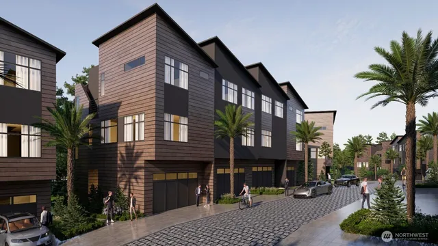 a view of a building with a garden and pathway