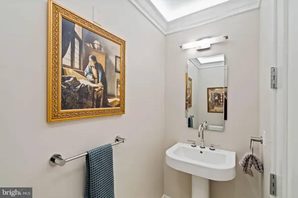a bathroom with a granite countertop tub sink and shower