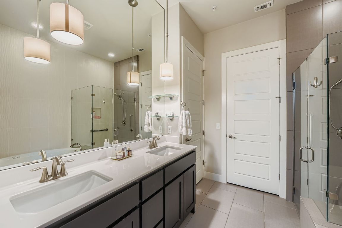 3905 Teaff Street Austin, TX 78723 - Photo 11 of 18 Full bath with double vanity
