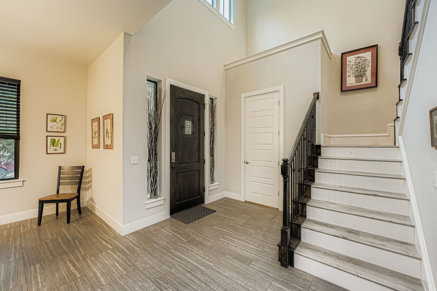 3905 Teaff Street Austin, TX 78723 - Photo 2 of 18 a view of a hallway with wooden floor and workspace
