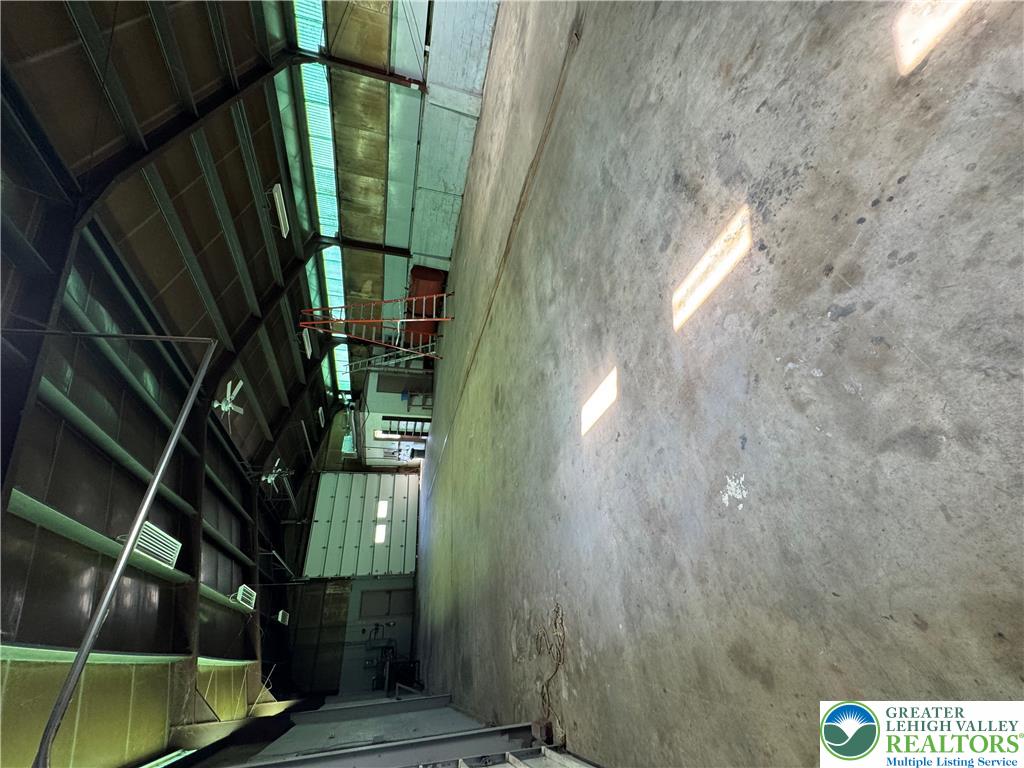868 Catawissa Road Tamaqua, PA 18252 - Photo 64 of 67 A spacious industrial interior with robust concrete flooring, ready for various operational needs.