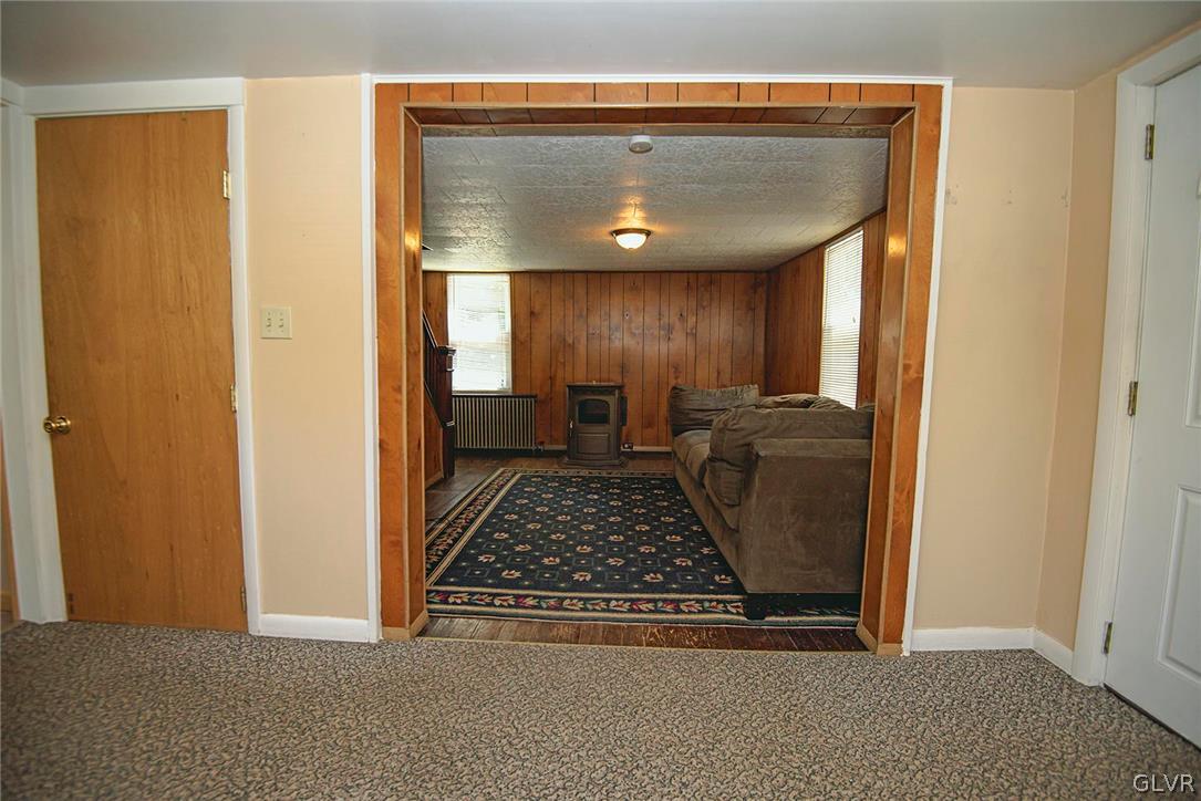 519 Shooktown Road Bangor, PA 18013 - Photo 17 of 35 a view of a hallway to filled with furniture and a rug