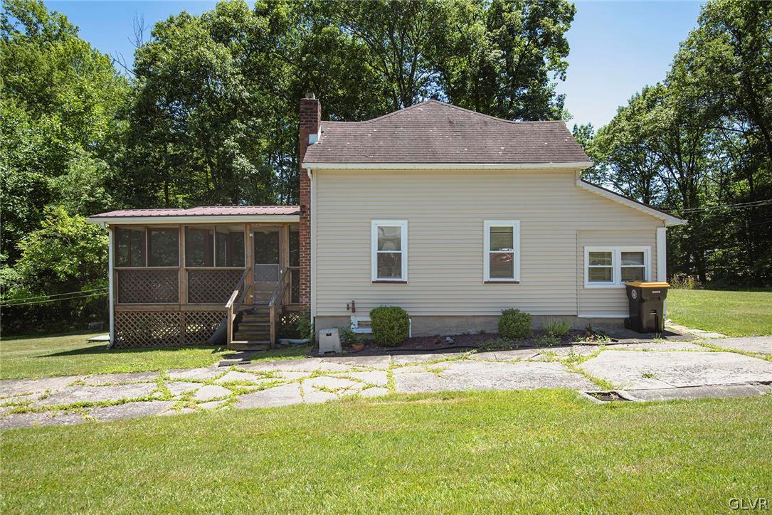 519 Shooktown Road Bangor, PA 18013 - Photo 5 of 35 a house that has a big yard with swimming pool in front of it