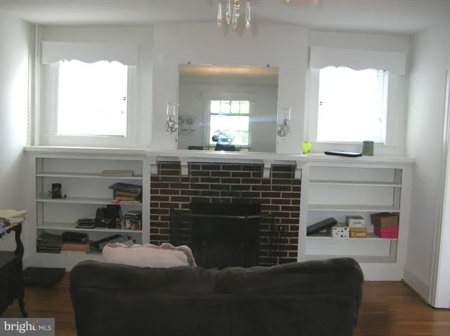 a kitchen with sink refrigerator and window