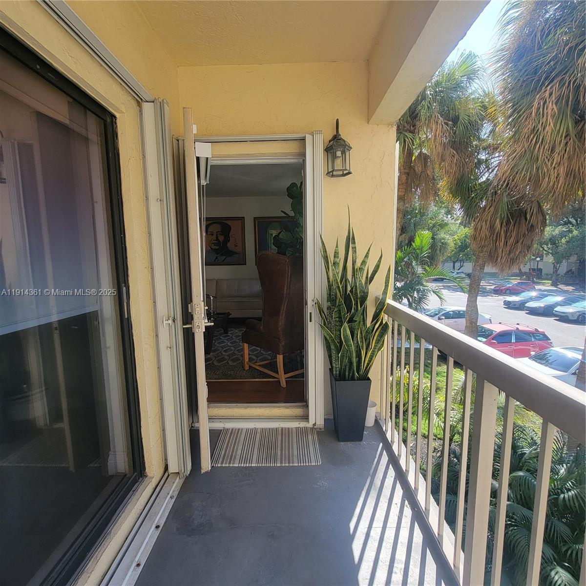 8180 Geneva Court, Unit 219 Doral, FL 33166 - Photo 19 of 19 a view of balcony with a porch