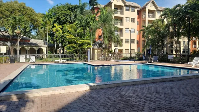 a view of a house with a swimming pool