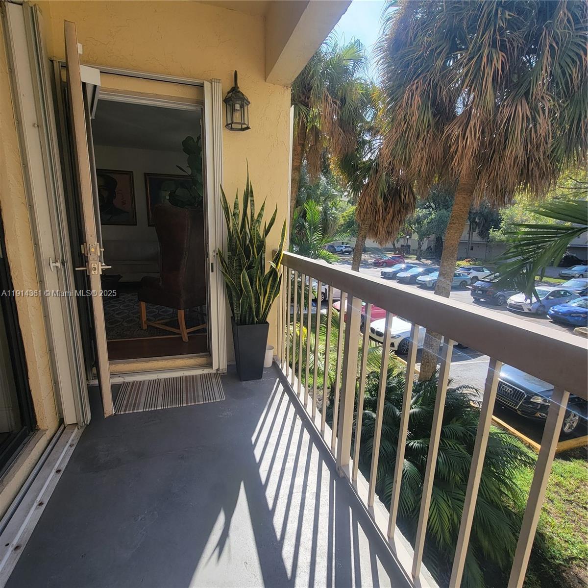8180 Geneva Court, Unit 219 Doral, FL 33166 - Photo 10 of 19 a view of balcony with furniture