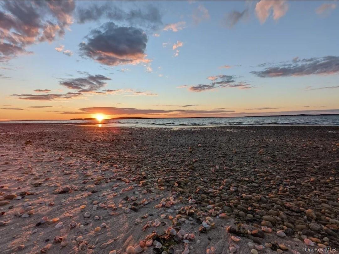 83 Hampton Road Sag Harbor, NY 11963 - Photo 3 of 6 a view of an ocean and beach