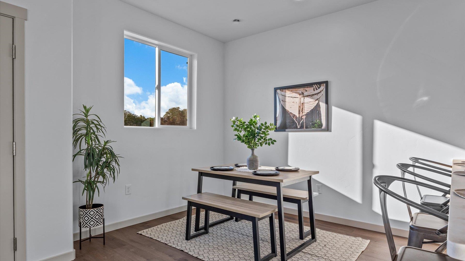 2786 Caspian Way, Unit A Grand Junction, CO 81503 - Photo 11 of 42 a dining room with furniture and wooden floor
