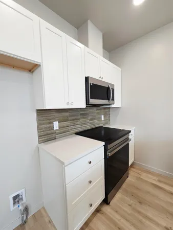 a view of storage and utility room