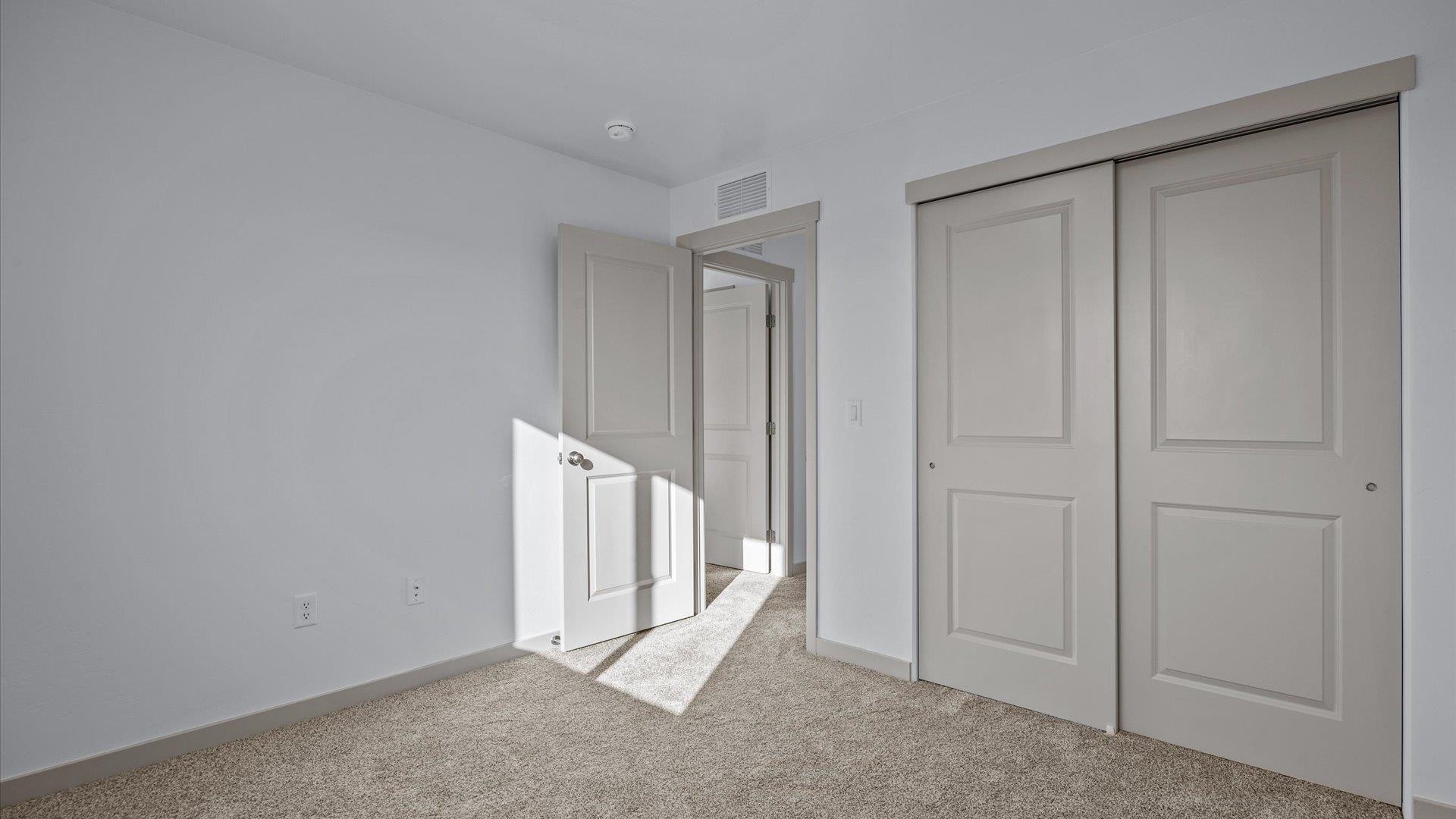 2786 Caspian Way, Unit A Grand Junction, CO 81503 - Photo 23 of 42 an empty room with a door
