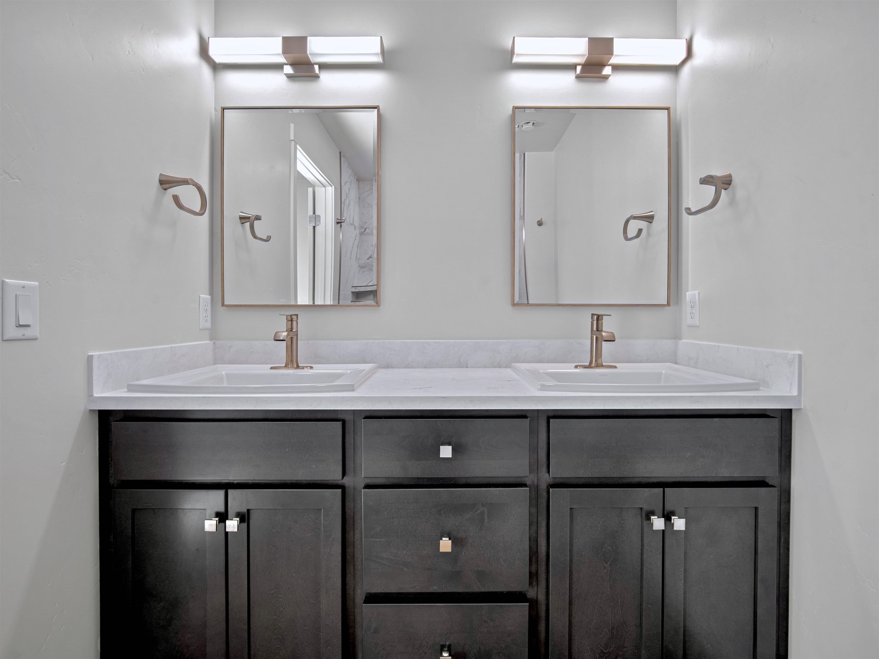 2786 Caspian Way, Unit A Grand Junction, CO 81503 - Photo 33 of 42 a bathroom with a sink and a mirror