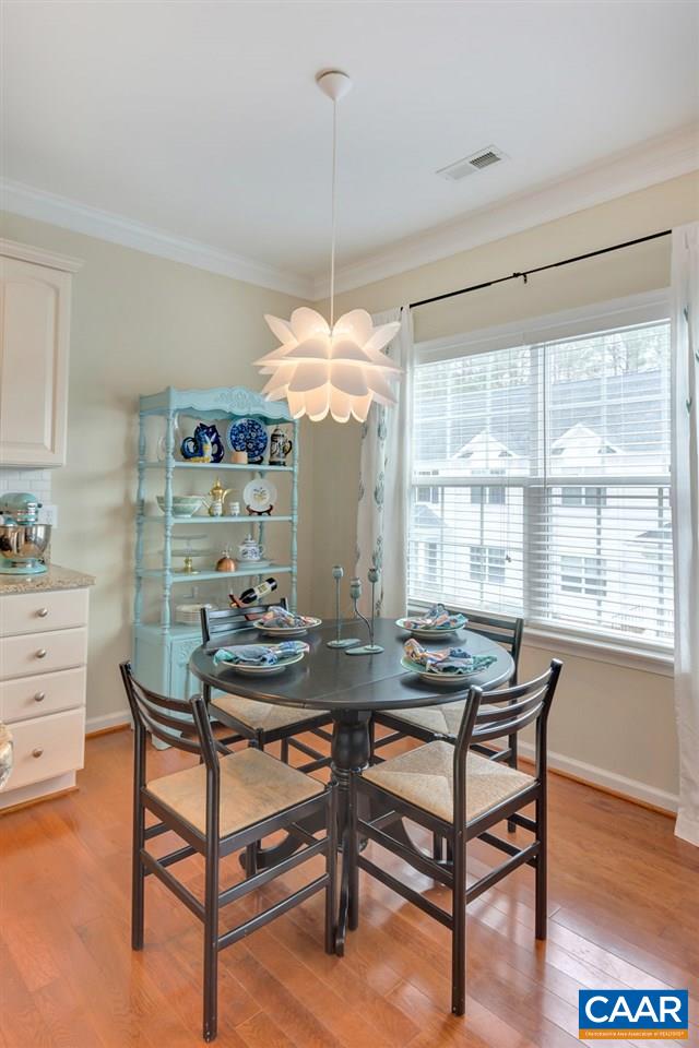 343 Quarry Road Charlottesville, VA 22902 - Photo 11 of 34 a dining room with furniture and window