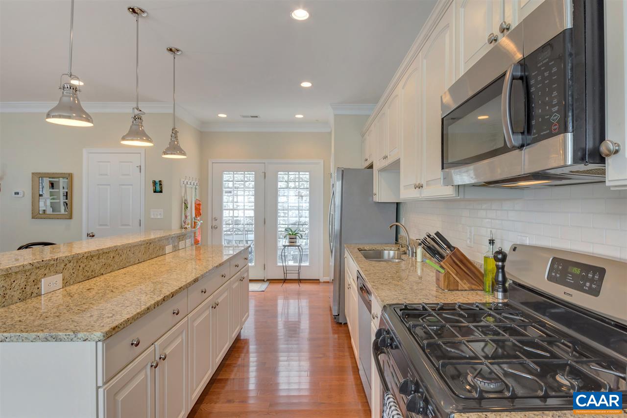 343 Quarry Road Charlottesville, VA 22902 - Photo 12 of 34 a kitchen with sink stove and refrigerator