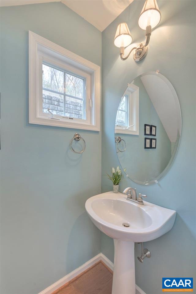 343 Quarry Road Charlottesville, VA 22902 - Photo 13 of 34 a bathroom with a sink and a mirror