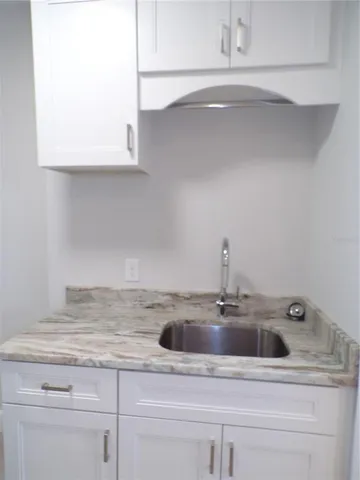 an entryway in a room with a window