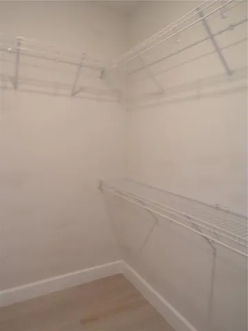 a white tub sitting in a bathroom