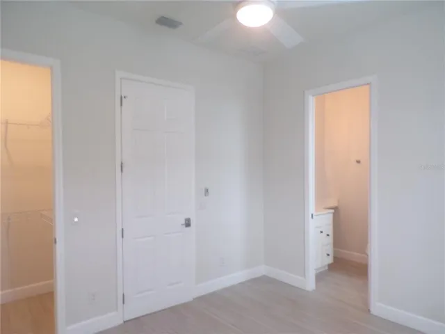 a view of a back yard of a house