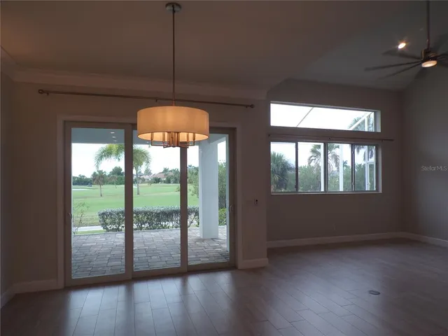 a large kitchen with stainless steel appliances kitchen island granite countertop a large counter top and stove