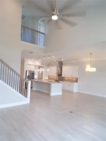 a utility room with sink dryer and washer