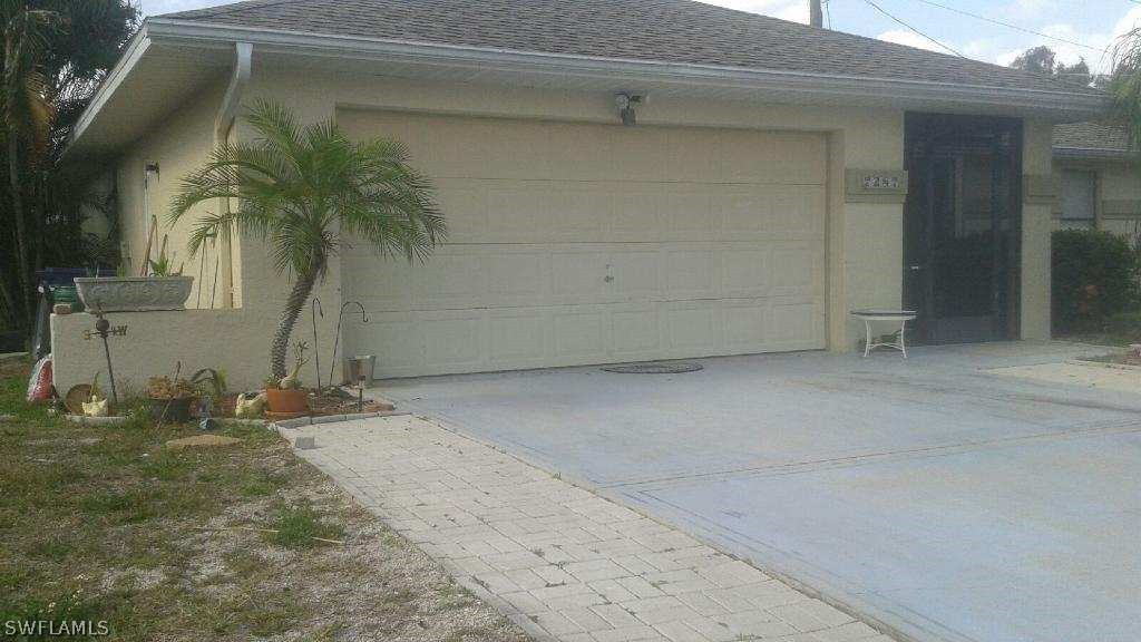 7287 Buchanan Road Fort Myers, FL 33967 - Photo 2 of 2 a view of a backyard space
