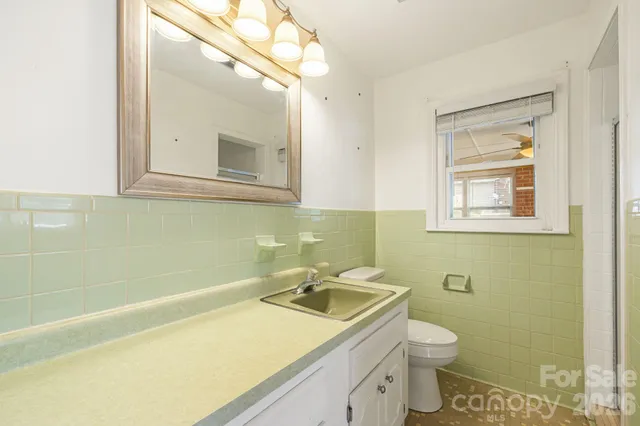 a bathroom with a sink and a toilet