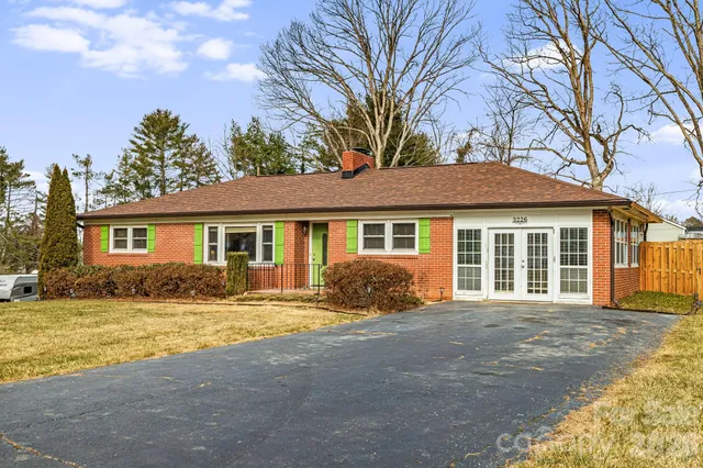 a front view of a house with a patio