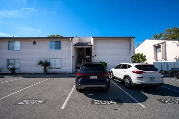 a car parked in front of a house