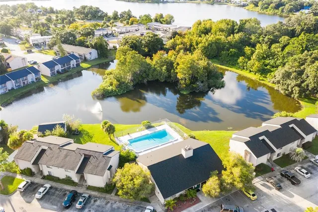 a balcony with table and chairs