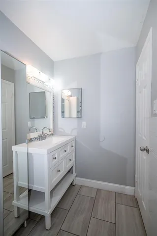 a bathroom with a toilet and a bathtub