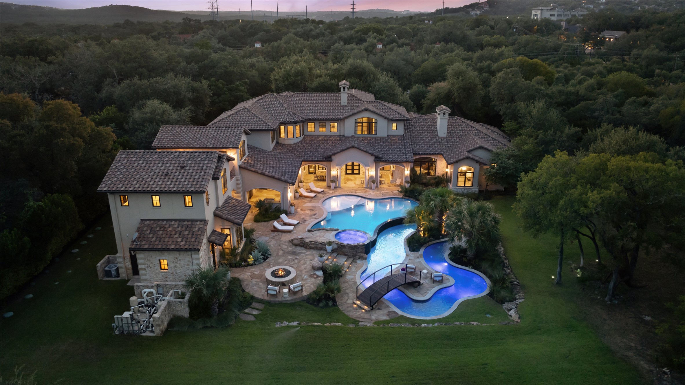 3667 Stoneridge Road Austin, TX 78746 - Photo 2 of 40 Nearly three flat acres stretch out around the home - rare, usable land in one of Austin’s most established neighborhoods.