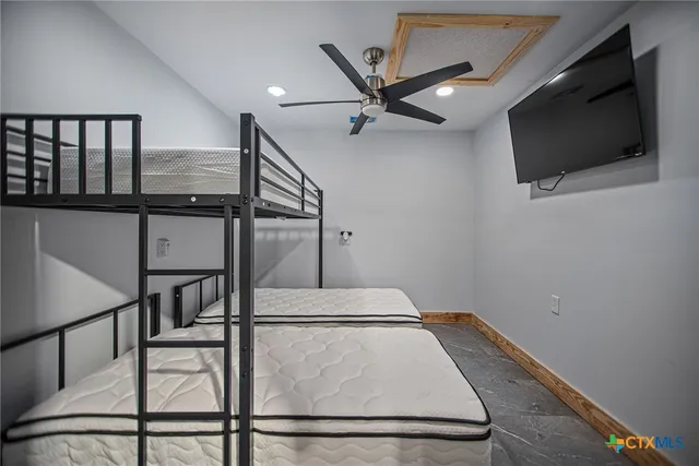 a bathroom with a toilet a sink and bathtub