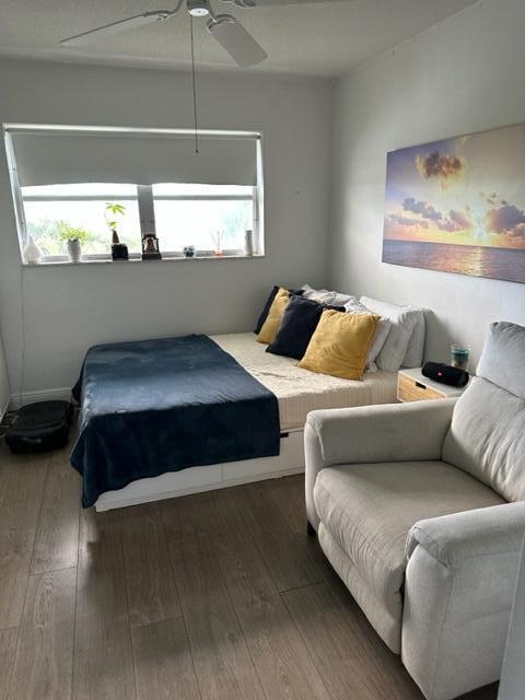 Undisclosed Address Lauderhill, FL 33313 - Photo 15 of 25 a bedroom with a bed and window